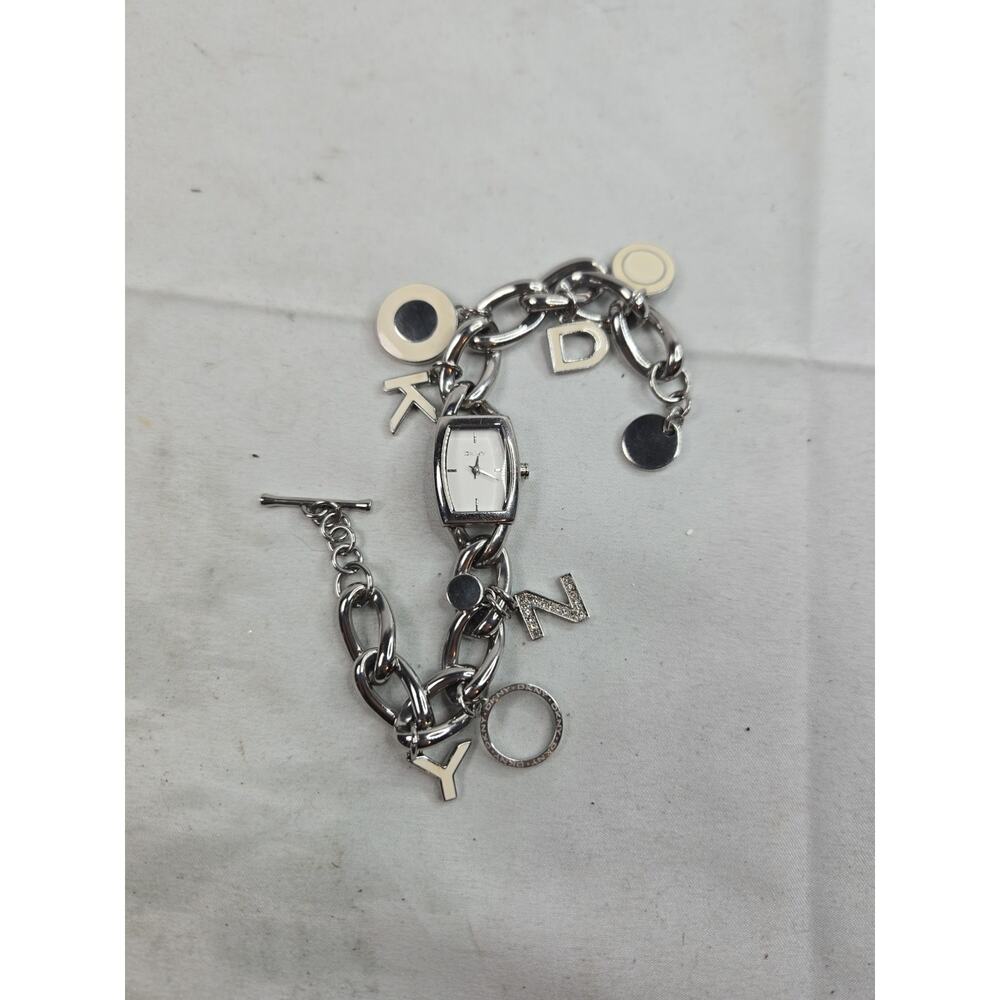 Gorgeous DKNY Ladies Watch Model Number NY4830 with Charm Pendants